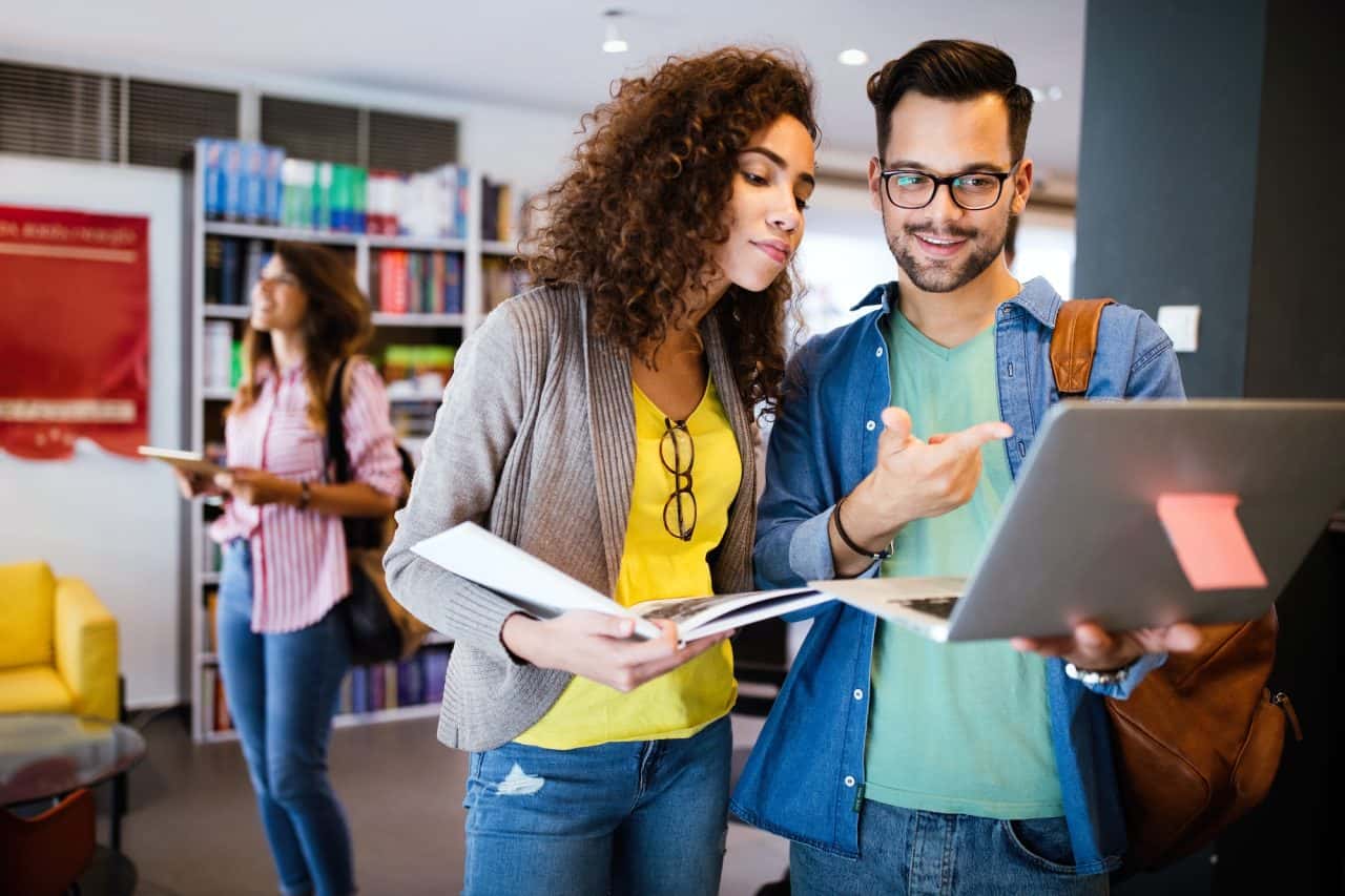 group-of-college-students-studying-in-the-school-library Home