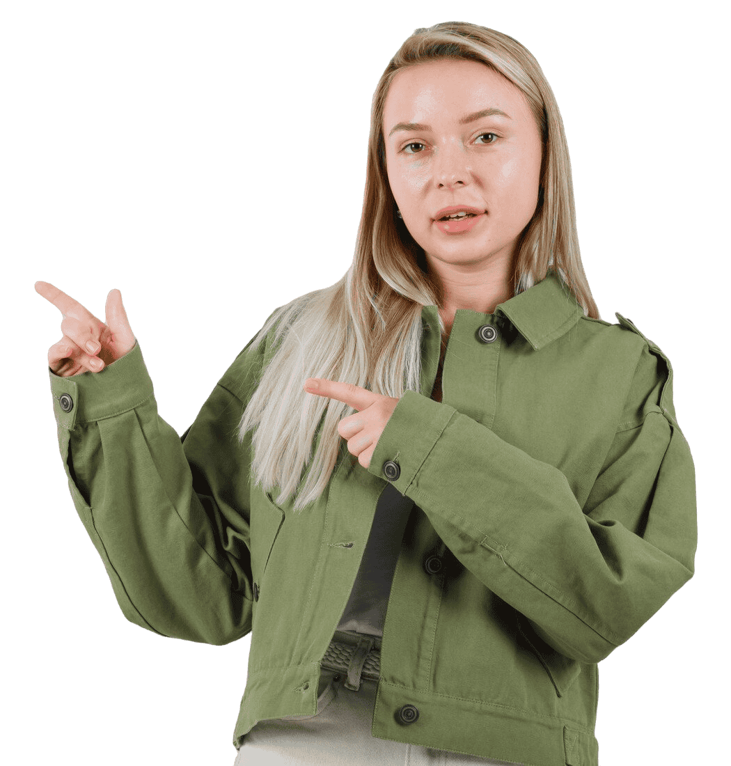 blonde-lady-jacket-pants-pointing-upper-left-corner-looking-sensible-front-view-e1738817962998 Home